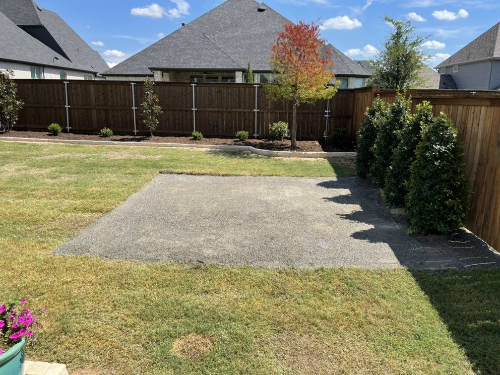 Before: bare gravel pad and empty fence line