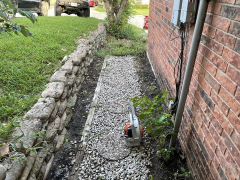 Side yard regraded and gravelled