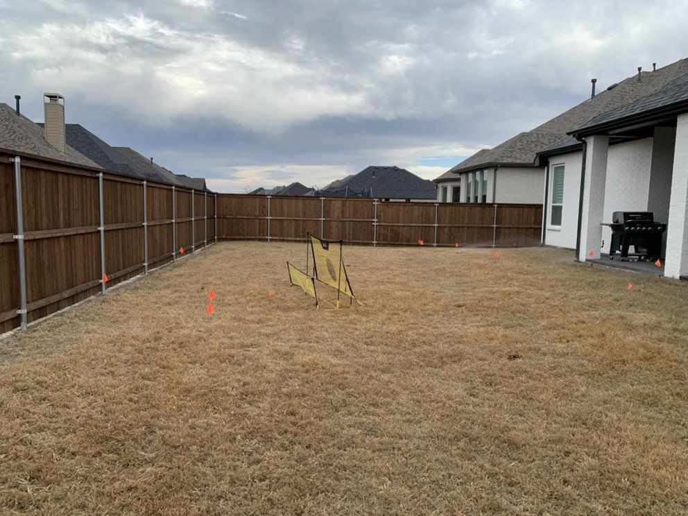 Before: bare dirt yard after the pool contractor left