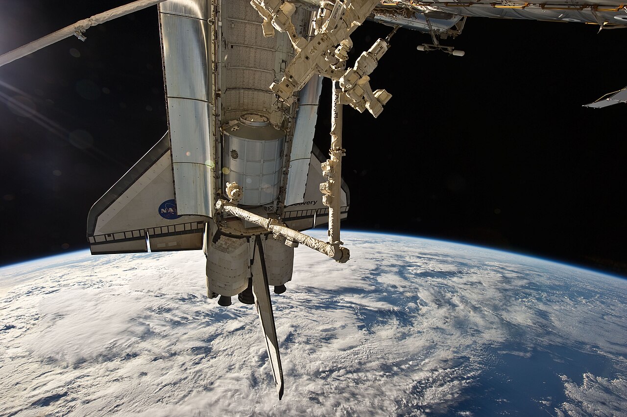 Canadarm2 grapples the Leonardo module during Space Shuttle mission STS-131