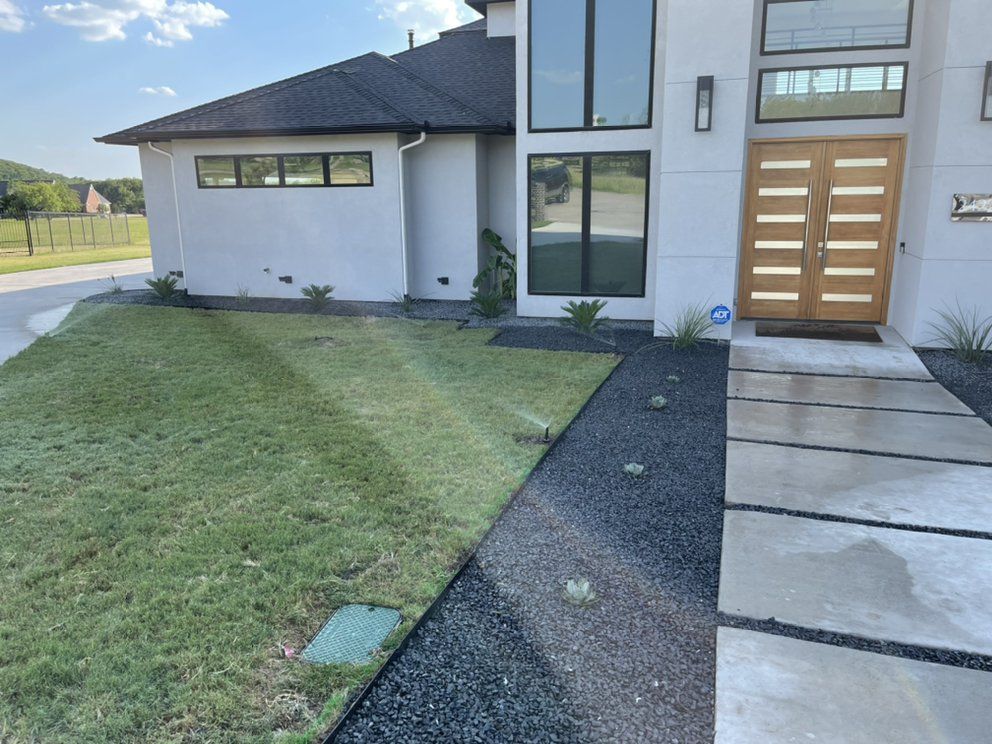 After: Tejas gravel beds, steel edging and new walkway